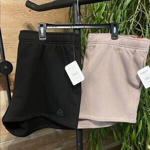 NWT 2 pair of Reebok weekender athletic shorts  XL. Black. Mocha tan